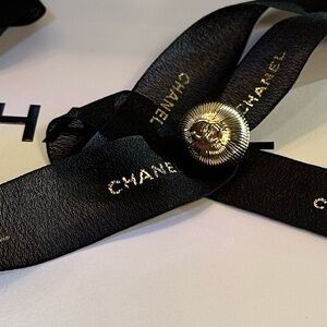CHANEL Holiday 2025 packaging Charm button